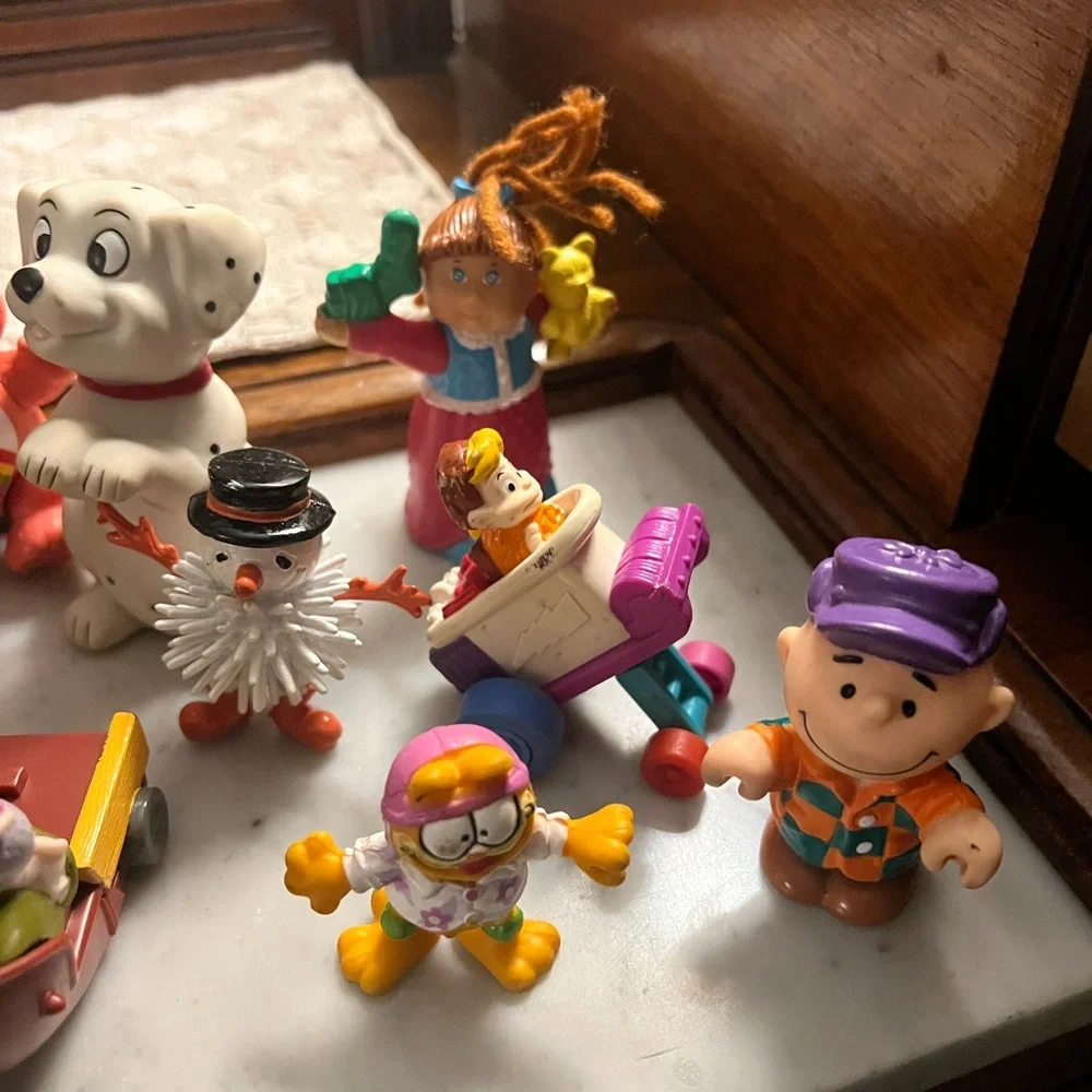 17 Piece Lot of Mixed Character Figurines Disney Care Bears Cabbage Patch Peanut